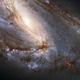 Illustration for article titled Leos Biggest Galaxy Roars With Supernovas And Star Factories